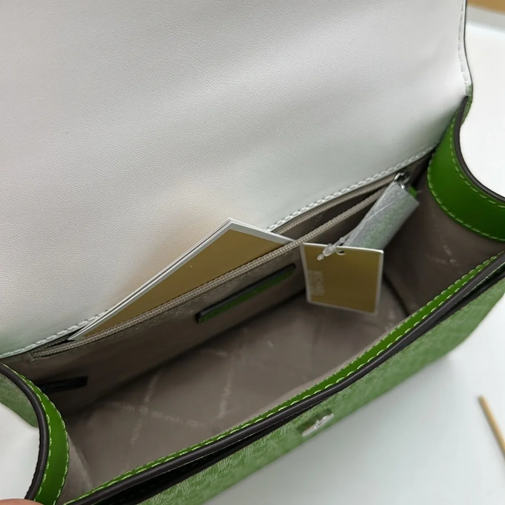 Michael Kors Greenwich Small Color-Block Signature Logo FlapCrossbody Bag
Jungle - Picture 12 of 16